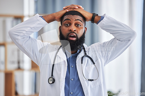 Image of Black man, portrait and shocked doctor in hospital after announcement, gossip or bad news. Omg, wow and disappointed medical worker with hands on head for surprise or healthcare results in clinic