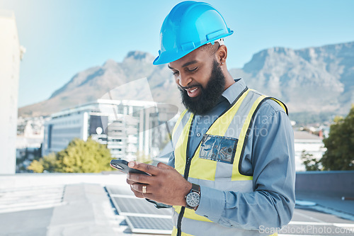 Image of Engineering man, solar panels and phone in energy saving, sustainability and project management or communication. Electrician or african person on mobile, eco friendly installation and city rooftop