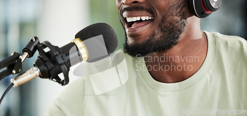 Image of Microphone, headphones and man streaming live, closeup and media broadcast with web radio host. Happy person, influencer or content creator with mic, internet recording and networking with happiness