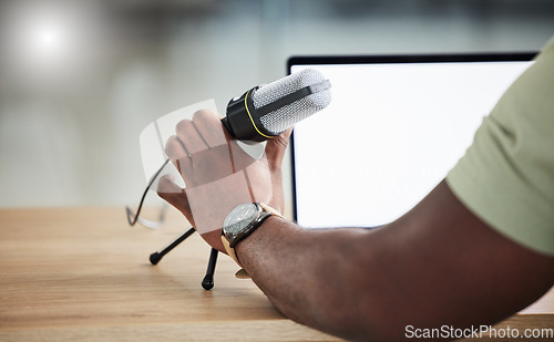 Image of Microphone, laptop screen and mockup with hand of person for live streaming, radio and speaker. Social media, influencer and communication with closeup of man for podcast, digital and content creator