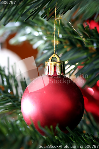 Image of Christmas ornaments on tree.