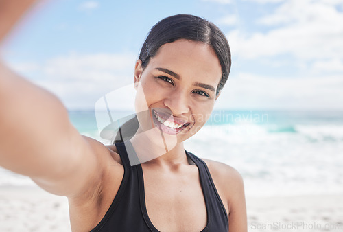 Image of Happy woman, portrait and fitness on beach for selfie, photography or outdoor social media post. Female person smile for picture, photo or memory in workout, exercise or running on the ocean coast