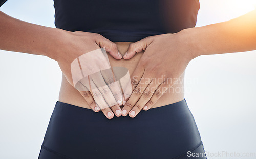 Image of Woman, heart and hands on stomach for fitness, weightloss diet and gut wellness on flare of white background. Closeup, abdomen and finger shape of love, emoji or sports exercise for healthy digestion