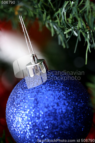 Image of Christmas ornaments on tree.