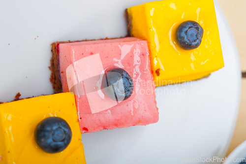 Image of strawberry and mango mousse dessert cake