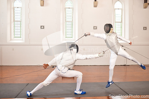 Image of Fencing, sport and people with sword to fight in training, exercise or workout in hall. Martial arts, stab and fencers or men jump in mask and costume for fitness, competition or target in swordplay