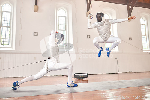 Image of Jump, fencing and people with sword to fight in training, exercise or workout in a hall. Martial arts, sports and fencers or men with mask and costume for fitness, competition or target in swordplay