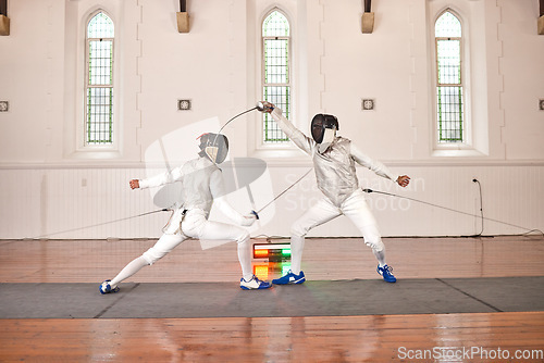 Image of Sword, sport and men fight in fencing training, exercise or workout in a hall. Martial arts, match and fencers or people with mask and costume for fitness, competition or stab target in swordplay