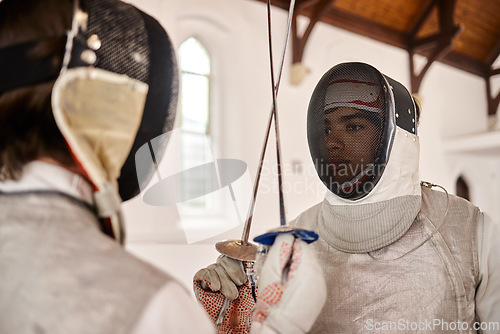 Image of Fencing, start and fight with sword in sports training, exercise or challenge in hall. Martial arts, combat and fencers or people with mask and costume for fitness, competition or target in swordplay