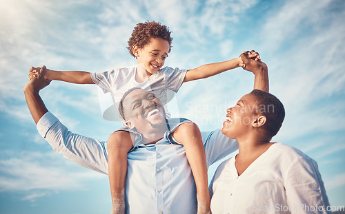 Image of Happy, black family and parents playing with kid or child outdoors on vacation, holiday or trip and bonding together. Mother and father carrying son on shoulders with smile, excited and happiness
