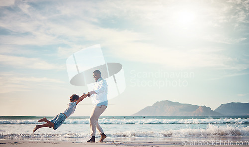Image of Happy, spinning and father with son at beach for bonding, support and summer break. Travel, playing and vacation with black man and child swinging together for holiday trip, weekend and happiness