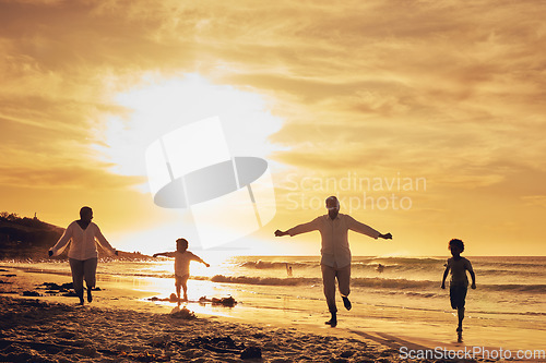 Image of Family, freedom with silhouette on beach at sunset, parents and kids running together with travel, care free and happy outdoor. Man, woman and children, ocean waves and vacation, nature and happiness