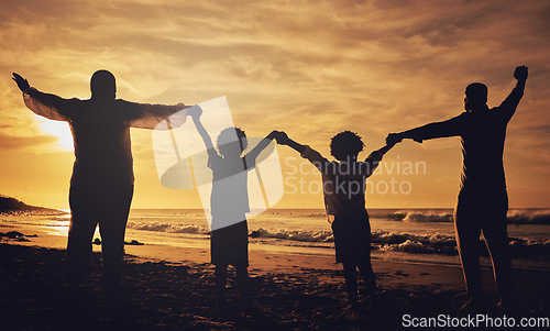 Image of Holding hands, sunset and silhouette of a family at the beach with love, freedom and happiness. Summer, travel and back of parents with children, affection and together in the dark by the ocean