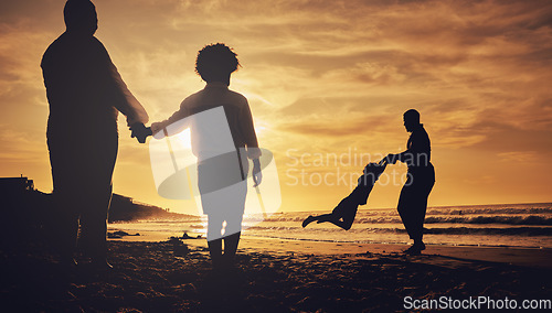Image of Silhouette, family and on beach for holiday, quality time and happiness on sand, weekend break and cheerful. Love, parents and children on summer vacation, sunset or bonding together, loving or relax