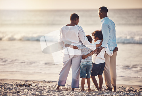 Image of Black family, hug at beach travel and together watching ocean waves and sunset view, freedom with parents and kids. Man, woman and children outdoor, vacation in Bali, nature and peace with back