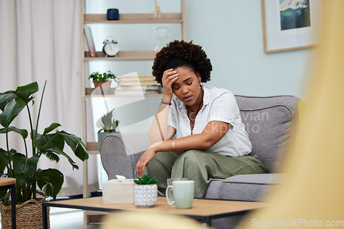 Image of Headache, woman and stress in home with anxiety, depression and trauma of debt. Sad girl in living room with crisis, psychology problem and pain of mistake, fear and tired of mental health risk