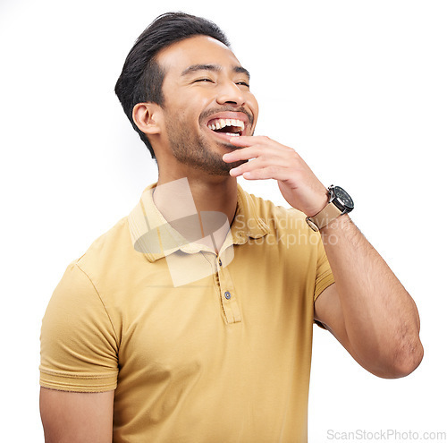 Image of Laugh, happy and young man in a studio listening to a funny, comedy or comic joke in conversation. Happiness, humor and handsome Mexican person with goofy or silly personality by white background