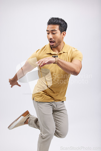 Image of Dance, movement and man in studio for freedom, energy and performance on white background. Creative, balance and happy, confident and isolated male person or dancer, moving and action pose for mockup