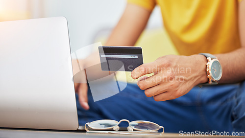 Image of Credit card, hand and laptop for online shopping, sale and payment with technology at home. Web banking, ecommerce and website promotion with person buying on computer for deal purchase on app