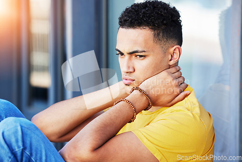 Image of Thinking, man and outdoor of home with stress and guy feeling depression and frustrated. Sad, grief and mental health of a male person with anxiety and tired from mistake and fail contemplation