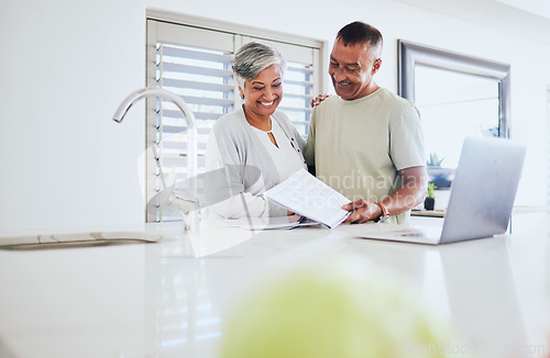 Image of Happy senior couple, paperwork and laptop for finance, budget or planning expenses together at home. Elderly man and woman smile in happiness on computer for financial documents, bills or mortgage