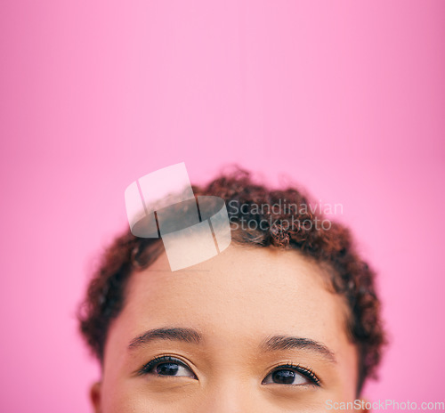 Image of Thinking, mockup and eyes of a woman on a studio background or wall for a vision, planning or idea. Closeup, young and the face of a girl or person with a solution and space on a pink backdrop