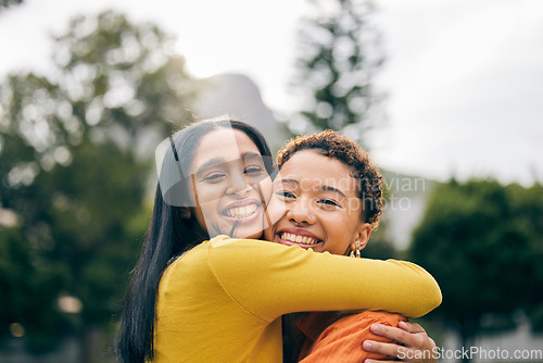 Image of Outdoor, portrait and queer couple hug, love and happiness with a marriage, relationship and smile. Lgbtq, happy women and female people in a park, pride and romantic with freedom, date and embrace