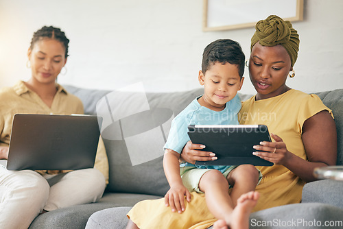 Image of Relax, tablet and family kid, mom or bisexual people reading online web story, e learning article and distance education. LGBTQ, lesbian mothers or relax gay woman teaching child on home lounge sofa