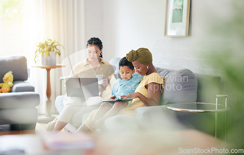 Image of Relax kid, tablet and family home, mother and gay people search social network, studying elearning and student ebook. LGBTQ, streaming education video and queer woman teaching child on lounge sofa