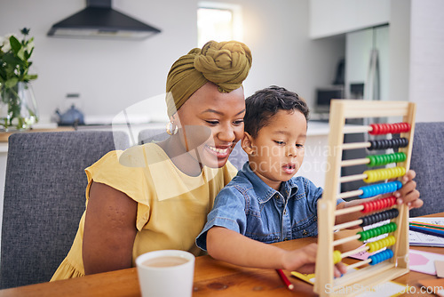 Image of Mom, child and learning with abacus for education or tutor, teacher or person helping with homework, study and counting. Kindergarten, math and development of boy through school or homeschooling
