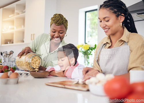 Image of Breakfast, child and gay family in home kitchen cooking for learning, development and love. Adoption, lesbian or lgbtq women or parents and a happy young kid together for cereal or food with help