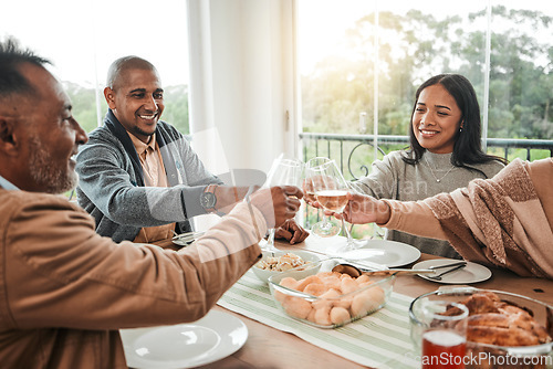 Image of Wine, food and toast with family at dining table for party, celebration and holiday. Lunch, happy and success with group of people and cheers with glass at home for event, support or dinner together