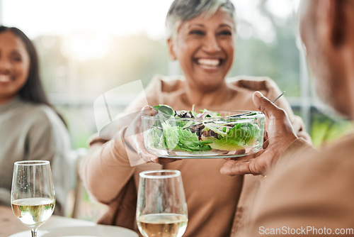 Image of Senior woman, salad and family dinner at thanksgiving celebration at home. Food, elderly female person and eating at a table with a smile from hosting, lunch and social gathering on holiday in house