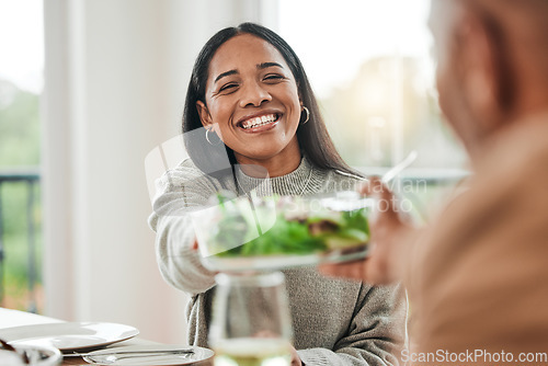 Image of Happy woman, salad and family dinner at thanksgiving celebration at home. Food, female person and eating at a table with a smile from hosting, lunch and social gathering on holiday in dining room