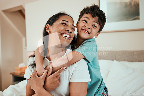 Image of Bed, mother and boy with love, hug and playful with quality time, relationship and happiness. Family, mama and male child with joy, home or fun in a bedroom, weekend or embrace with a loving smile