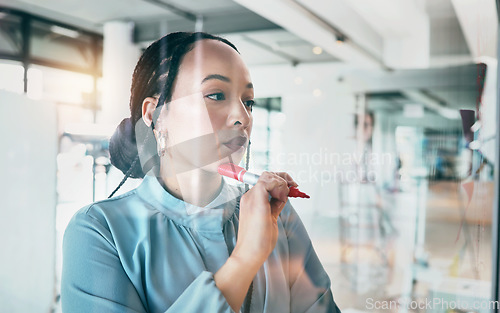 Image of Woman at glass, thinking with ideas and pen for business planning, brainstorming or working process. Mind map, creative plan and writing on moodboard for startup proposal, agenda or workshop schedule