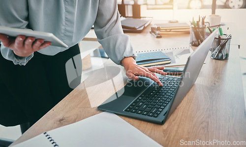 Image of Tablet, laptop typing and business hands at web analyst company with notes. Technology, person and online professional working in office with computer and digital data research job for project