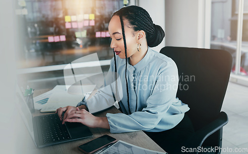 Image of Woman in office on laptop, research and sticky note ideas on moodboard for business plan, brainstorming or proposal process. Thinking, typing pitch and businesswoman on computer, mind map at startup.