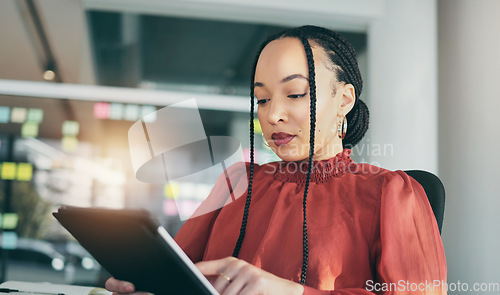 Image of Tablet, planning and a business black woman in her office, working online while reading a schedule or calendar. Technology, research and innovation with a corporate employee reading internet data