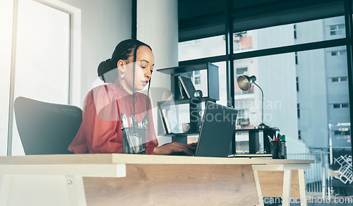 Image of Woman in office on laptop, research and ideas on website for business plan, brainstorming or proposal process. Thinking, typing pitch and businesswoman on computer, project manager in startup career.