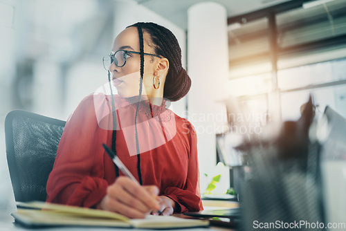 Image of Woman in office, writing in notebook with schedule and calendar, brainstorming and planning work. Business, ideas and notes with female employee, productivity and workflow with research and admin