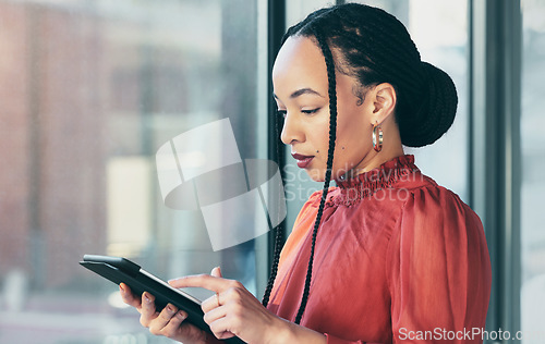 Image of Tablet, research and a business black woman in her office, working online for schedule or calendar planning. Technology, internet and search with a corporate employee reading data or information