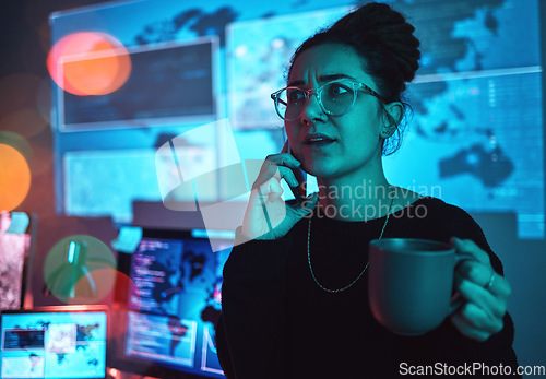 Image of Night, coffee and a woman hacker on a phone call during a cyber security emergency in her office. Communication, software and dark with a programmer talking about an information technology problem