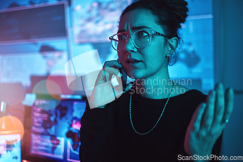 Image of Night, angry and a woman hacker on a phone call during a cyber security emergency in her office. Communication, software problem and dark with a female programmer talking about information technology