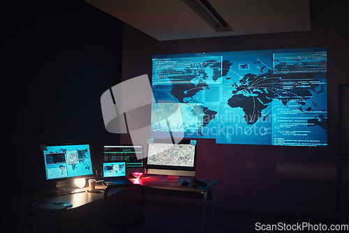 Image of Dark, empty office and computer for global research or monitor of a system. Closeup, technology abstract and a pc at night at company for programming, cloud computing or data science for the world