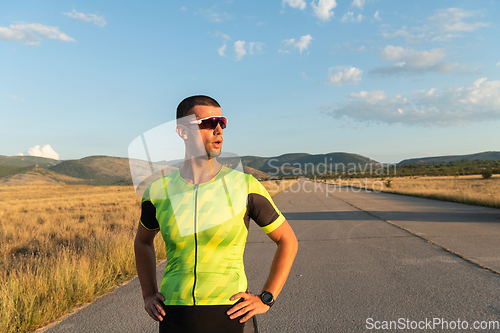 Image of Triathlete resting after exhausting training for the upcoming marathon.