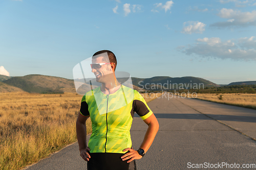 Image of Triathlete resting after exhausting training for the upcoming marathon.