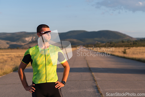 Image of Triathlete resting after exhausting training for the upcoming marathon.