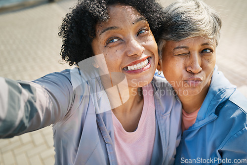 Image of Senior selfie, funny and women on the sidewalk for a memory, family together or quality time. Smile, comic and elderly friends taking a crazy photo in the street for community or travel in retirement