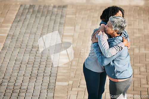 Image of Running, hug and women with mockup space, love and care for fitness and exercise. Athlete, wellness and female friends on a promenade with motivation, greeting embrace and smile from runner target